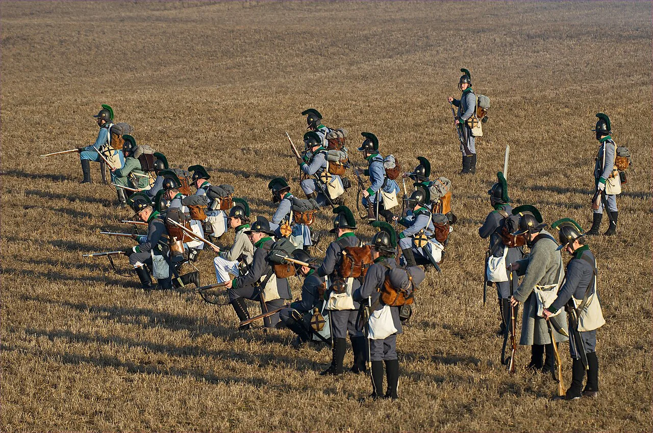 Reenactors in Napoleonic-era uniforms at an Austerlitz battle reenactment