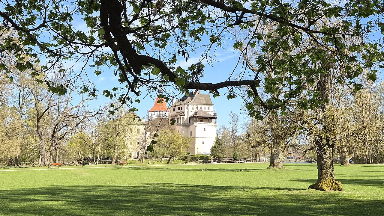 Blatná Chateau seen across the chateau park.