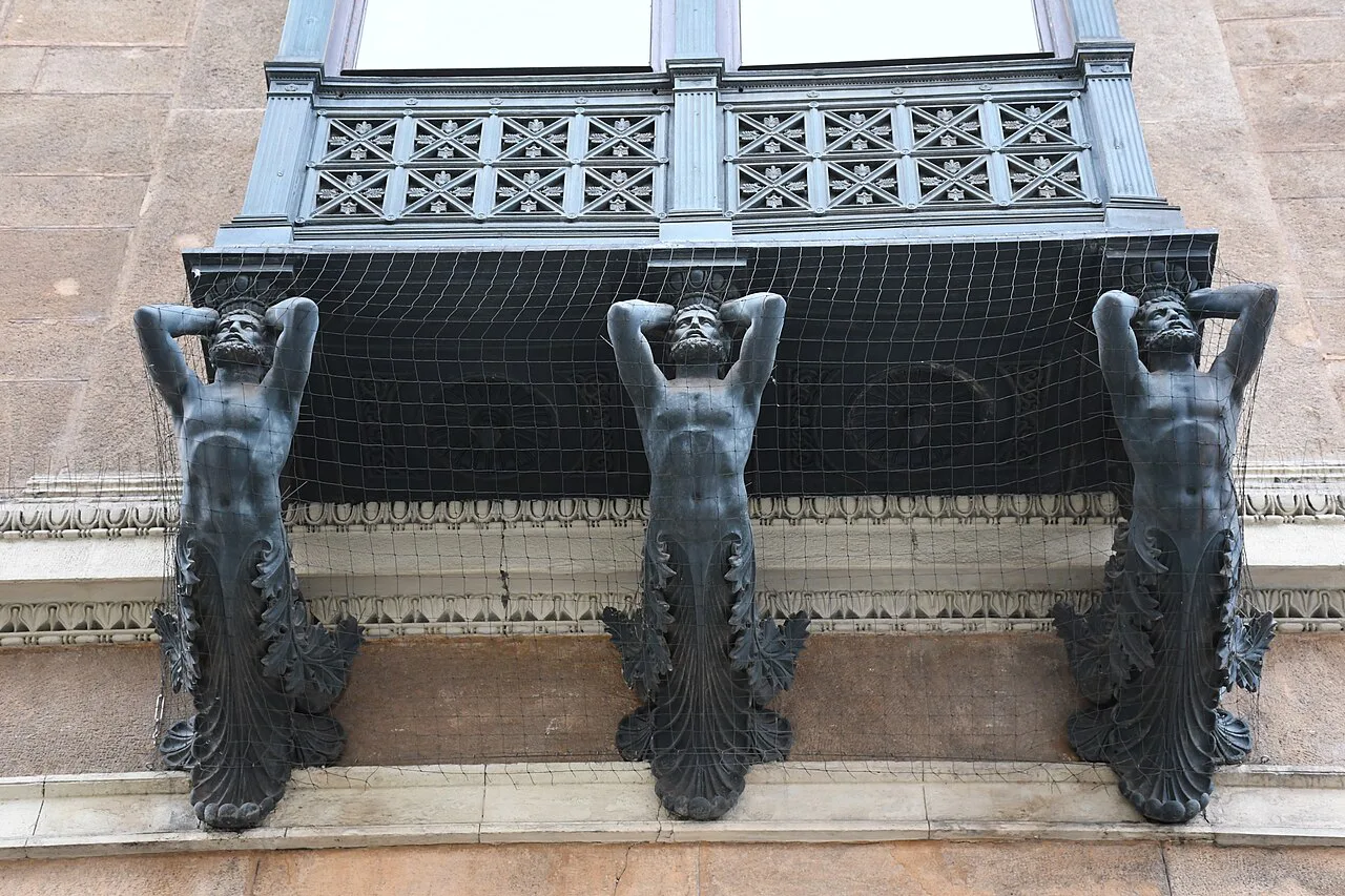 Cast-iron figures supporting a balcony on the Klein Palace, Brno.