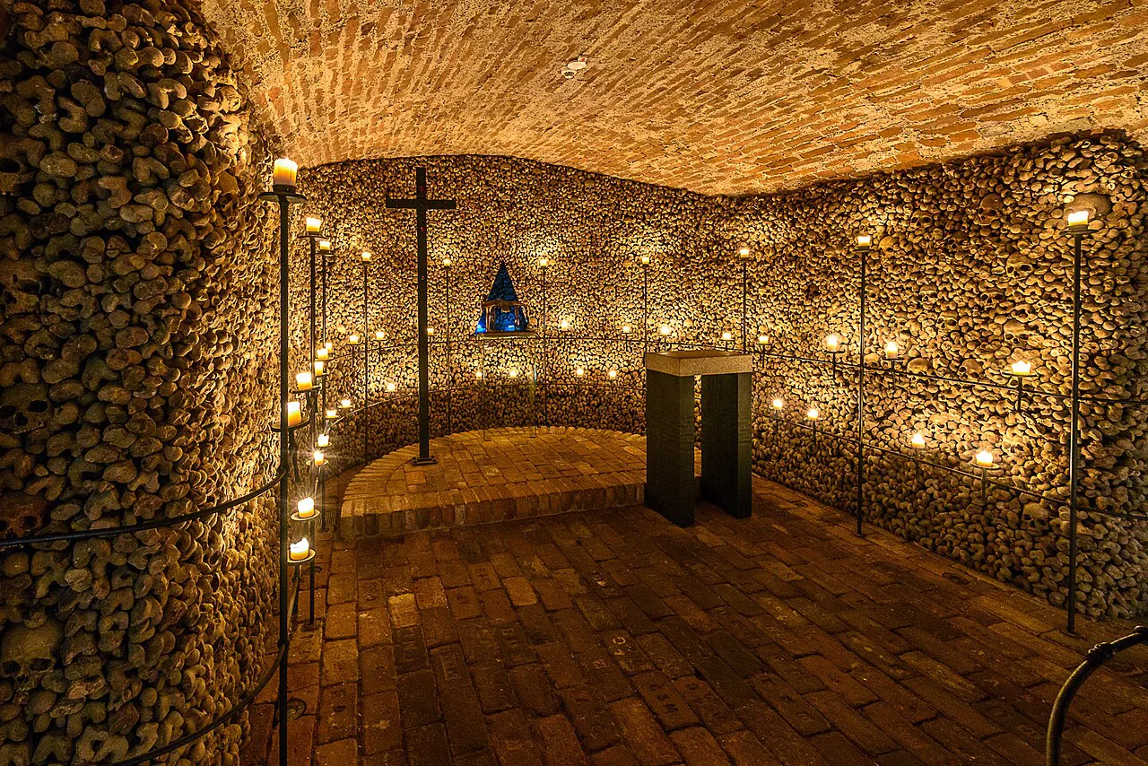 A vaulted chamber lined with bones in the Brno Ossuary at St. James Church.