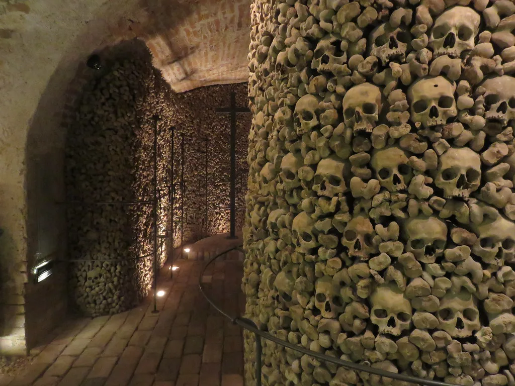 Brno Ossuary: skulls and bones in the underground crypt beneath St James Square.
