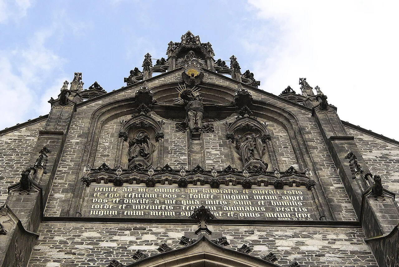 Carved stonework above the portal of the Cathedral of St. Peter and Paul, Brno.