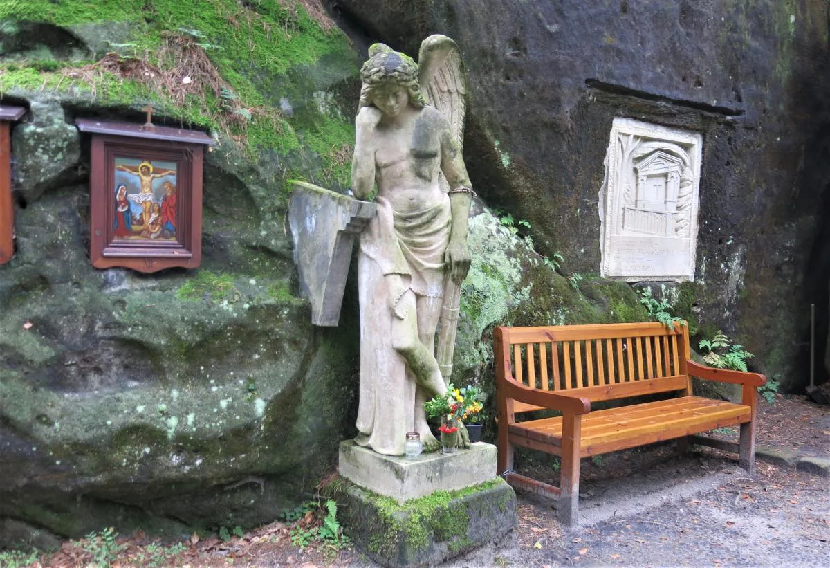 An angel statue at the Brethren's Altar rock site near Česká Kamenice.