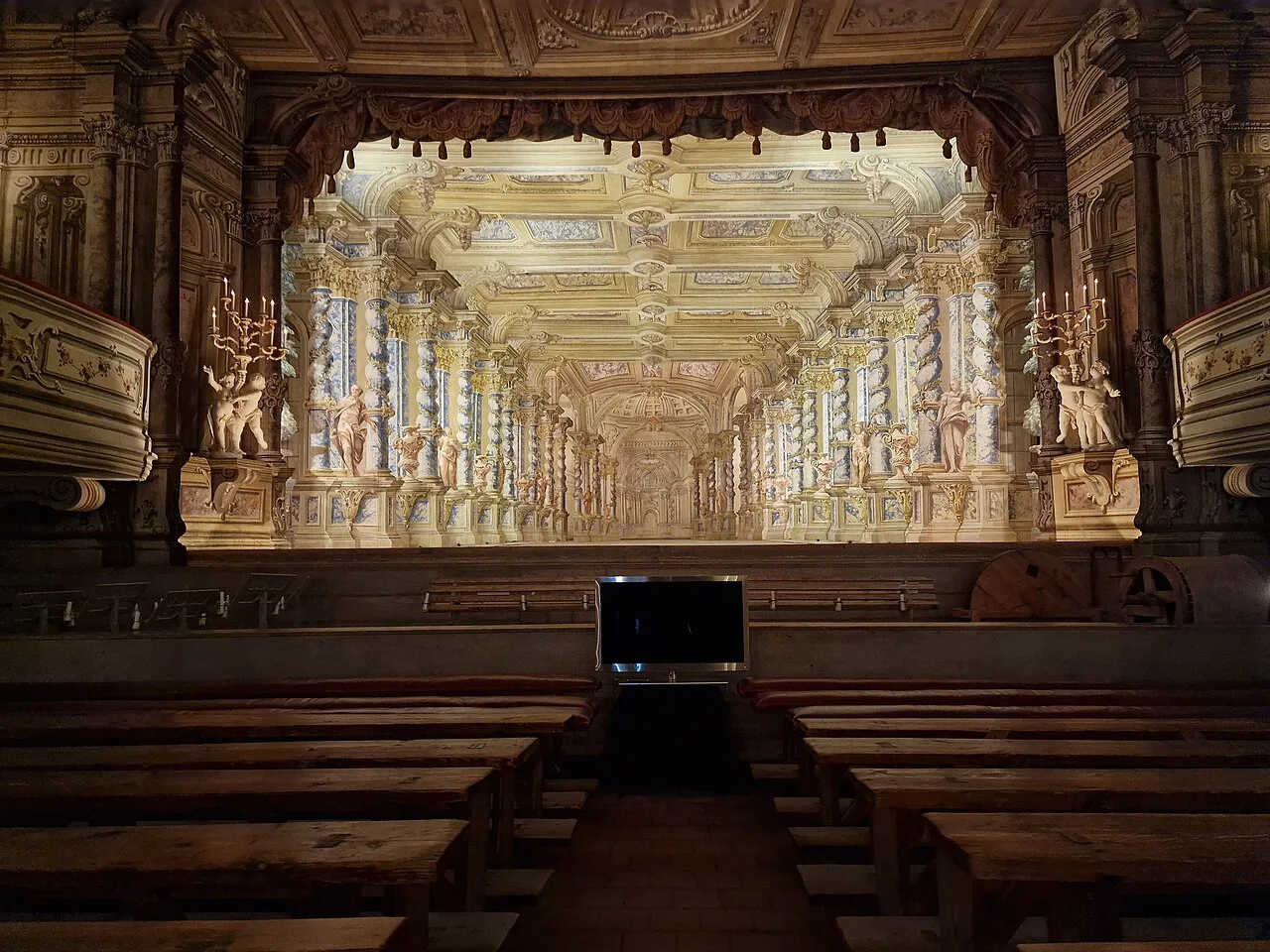 The stage and painted scenery of the Baroque Theatre at Český Krumlov Castle.