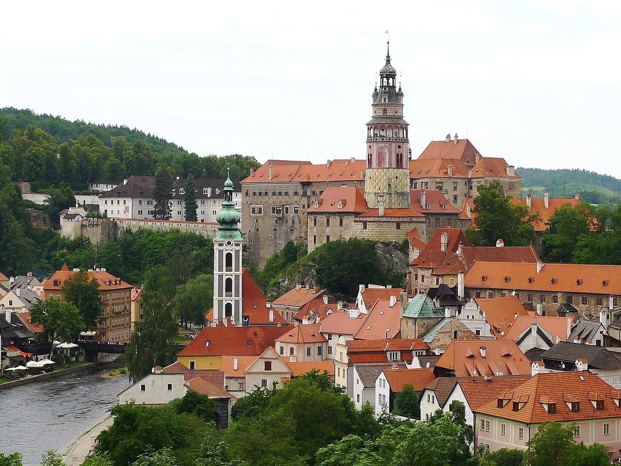 Český Krumlov Castle tower above the old town's red roofs.