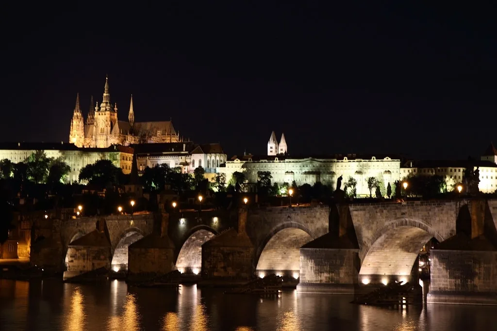 Charles Bridge and Prague Castle lit up at night