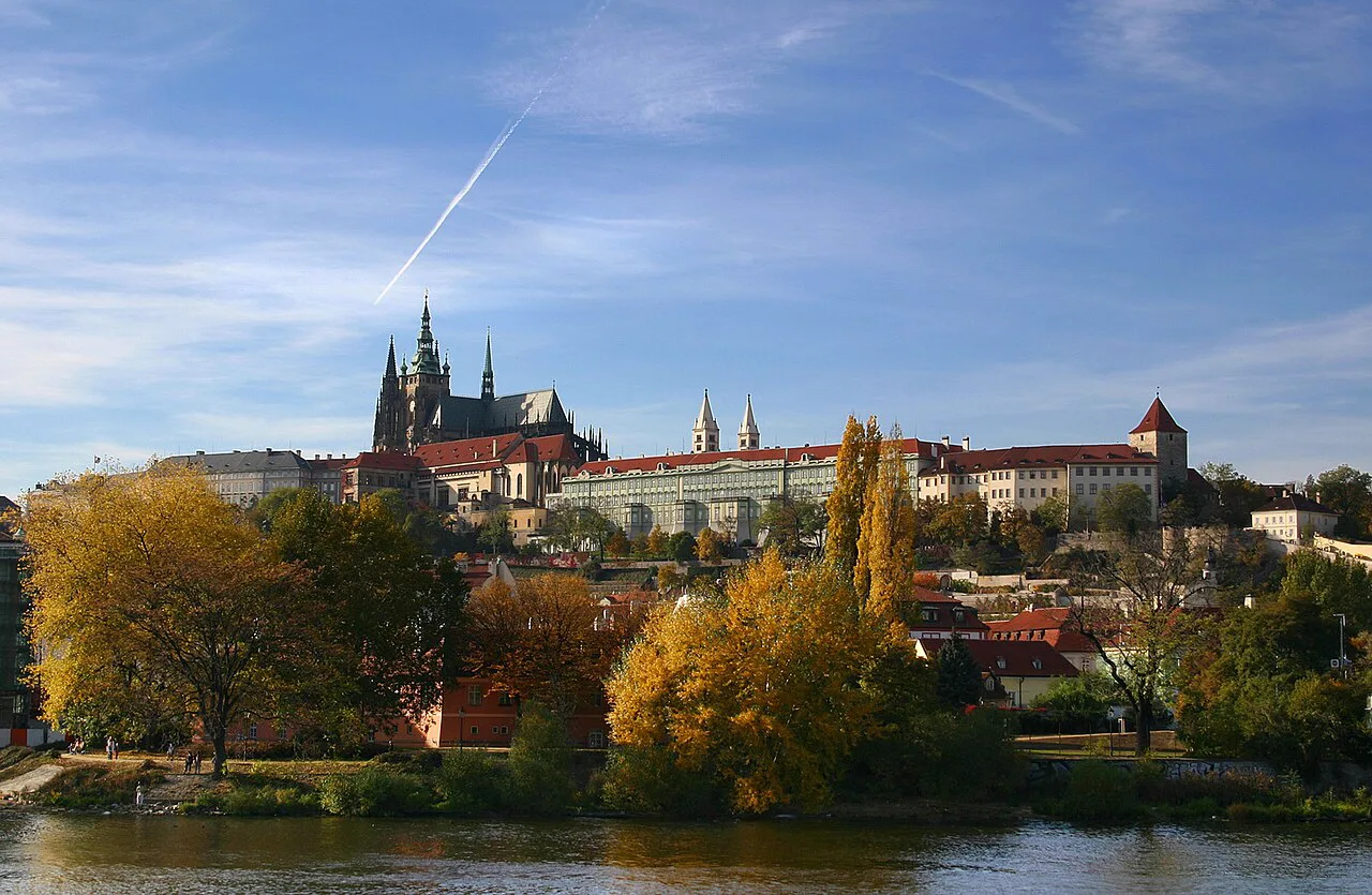 Prague Castle and St. Vitus Cathedral above the Vltava in autumn.