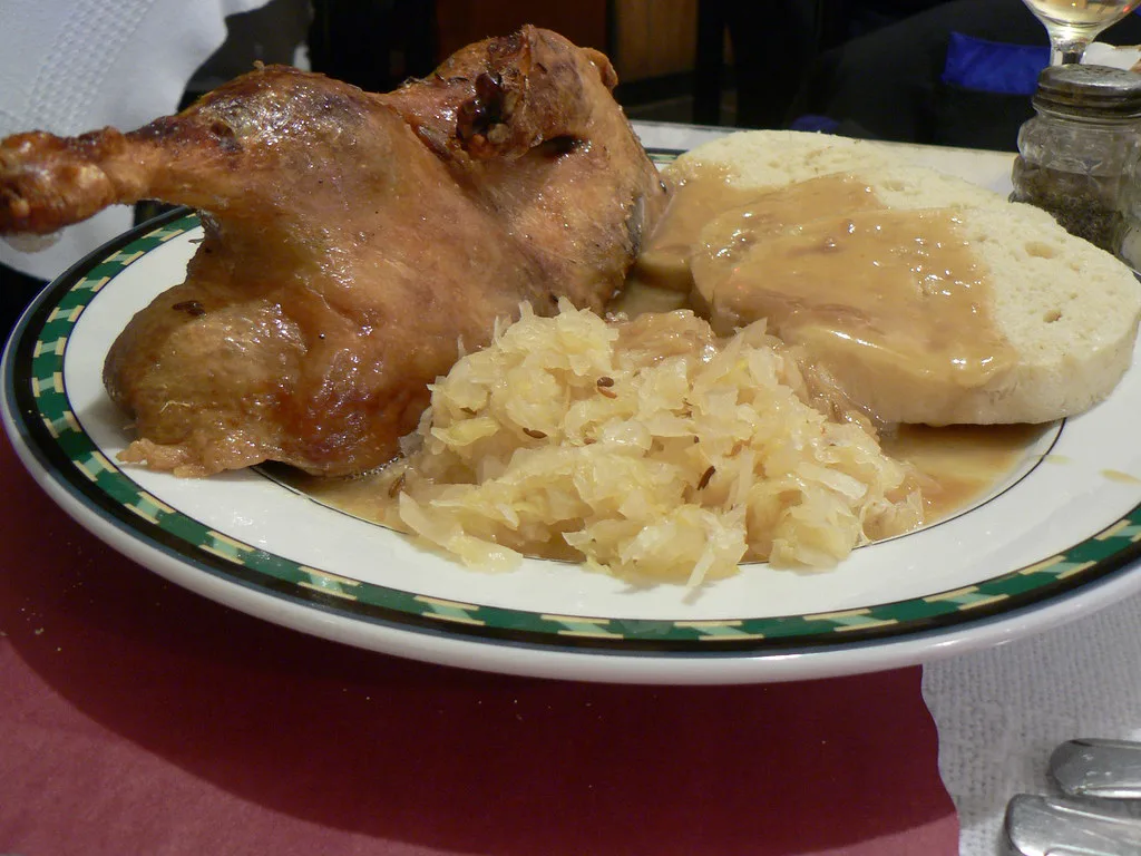 Roast duck with sauerkraut and bread dumplings
