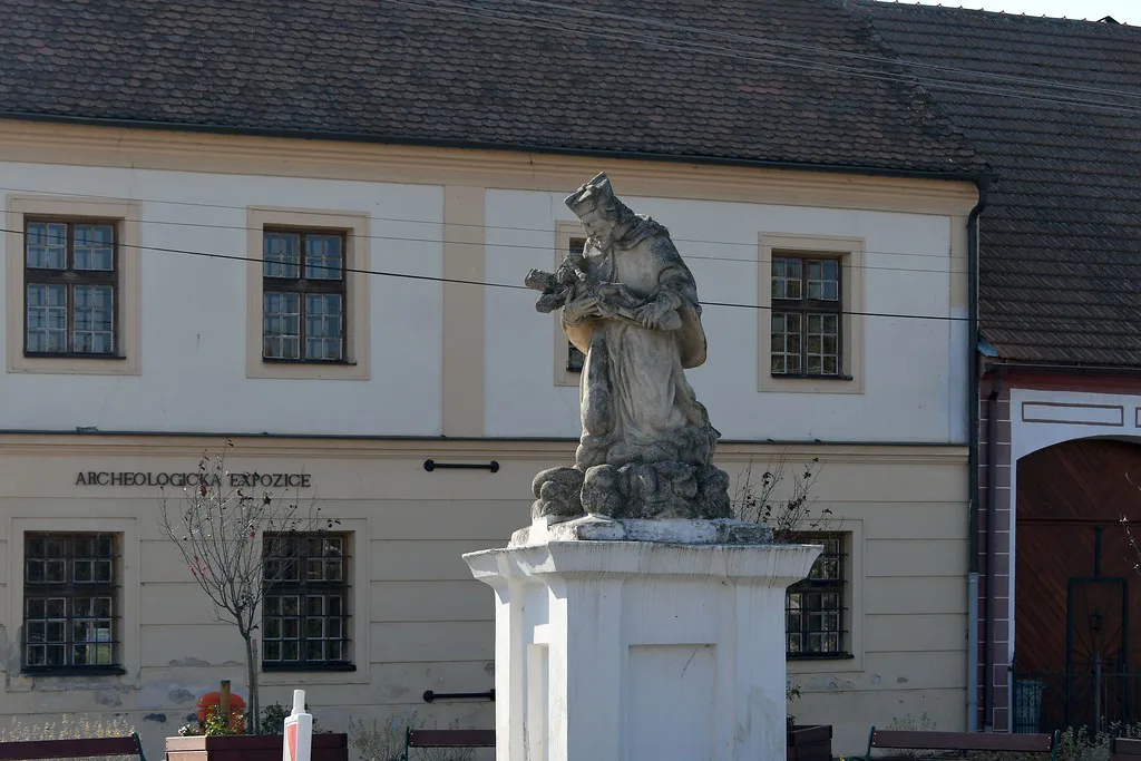 Stone statue in front of the archaeological exhibition building in Dolní Věstonice