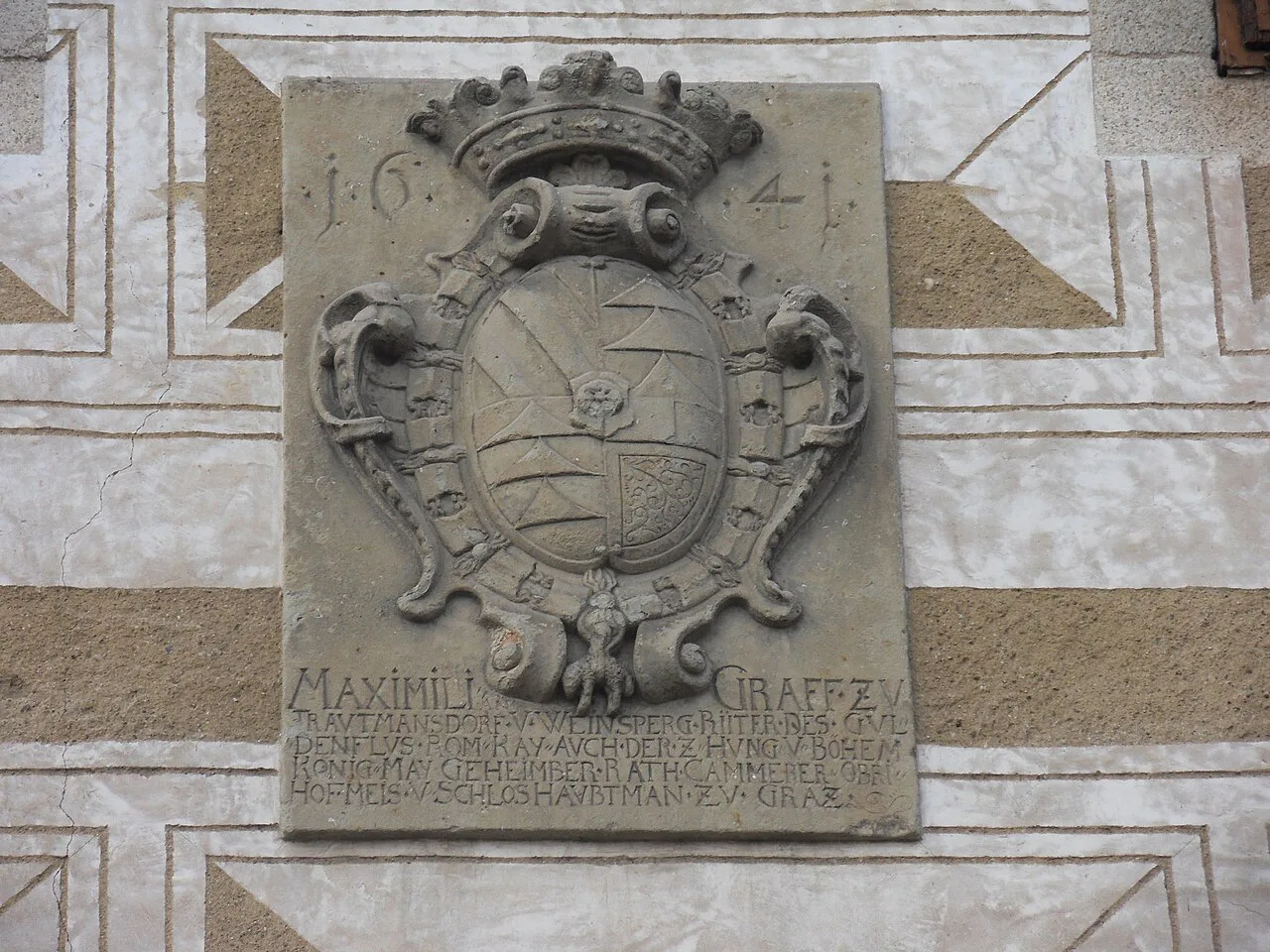 The Trauttmansdorff coat of arms on the wall of Horšovský Týn Castle.