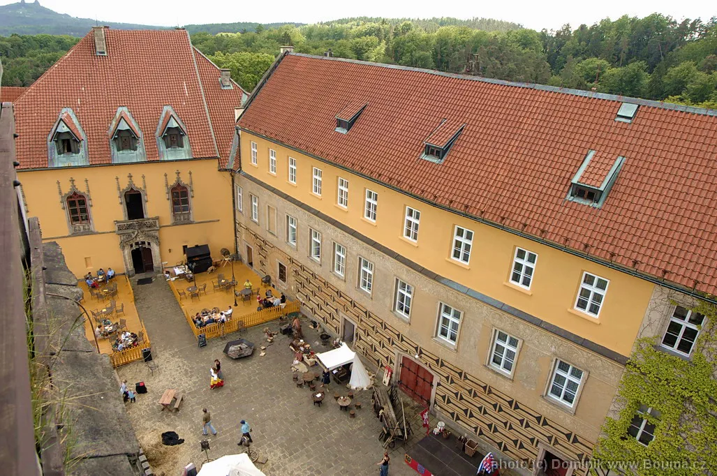 The courtyard of Hrubá Skála Castle seen from above.