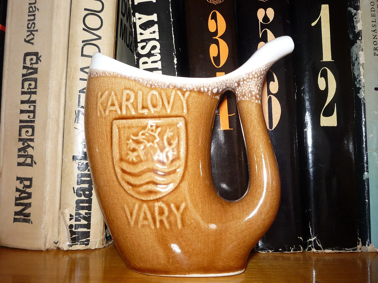 A ceramic Karlovy Vary spa drinking cup.