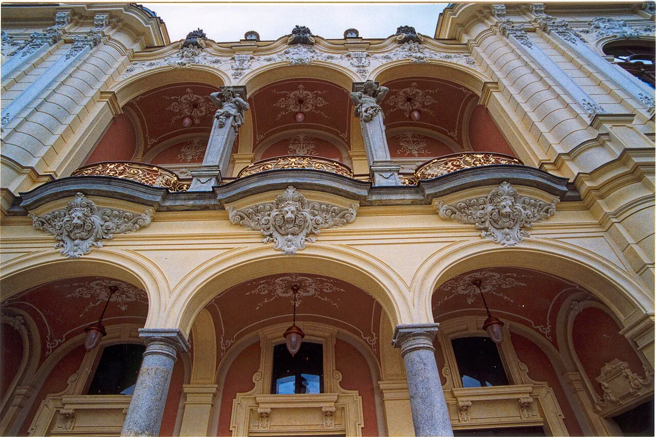 The ornate facade of the Karlovy Vary Municipal Theatre on Divadelní náměstí.