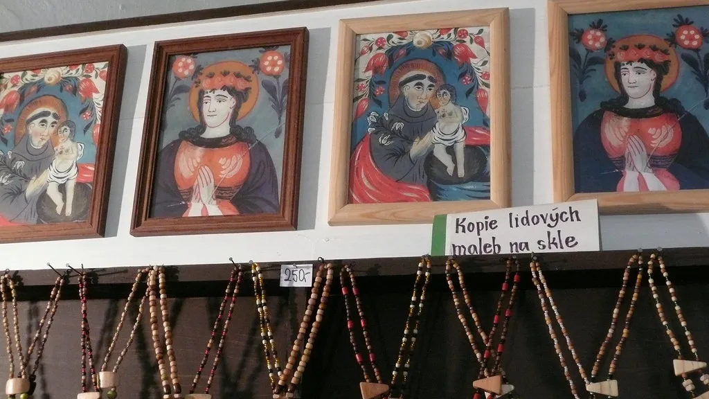 Copies of Czech folk paintings on glass for sale in a shop at Křivoklát Castle