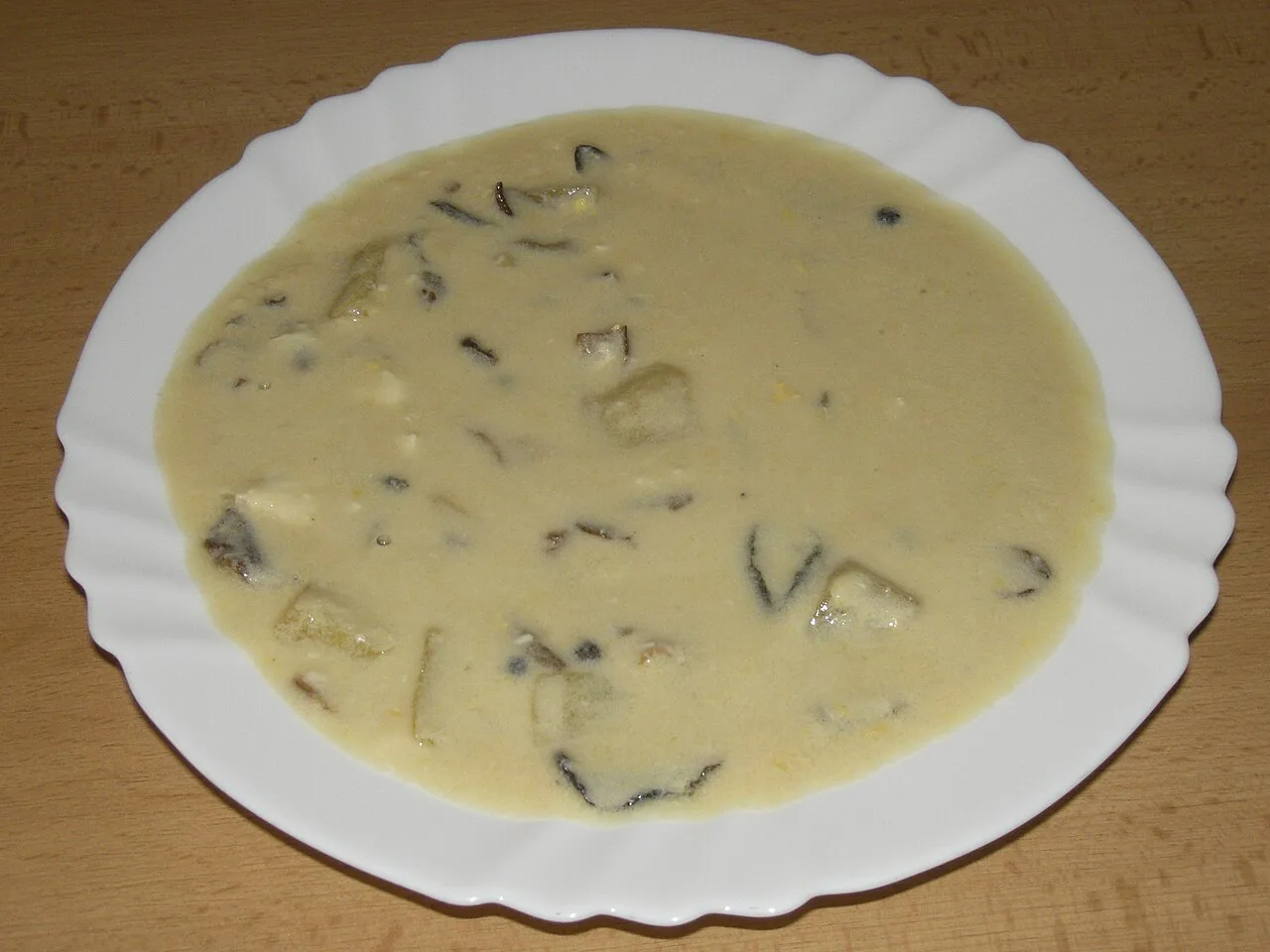 A bowl of kulajda, the creamy South Bohemian soup with mushrooms, potatoes and dill.