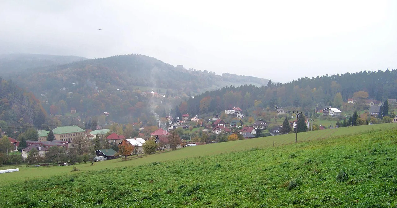 Malá Skála and the wooded hills of the Jizera valley.
