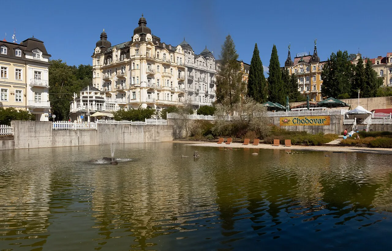 Grand hotels on Hlavní třída above a pond in Mariánské Lázně