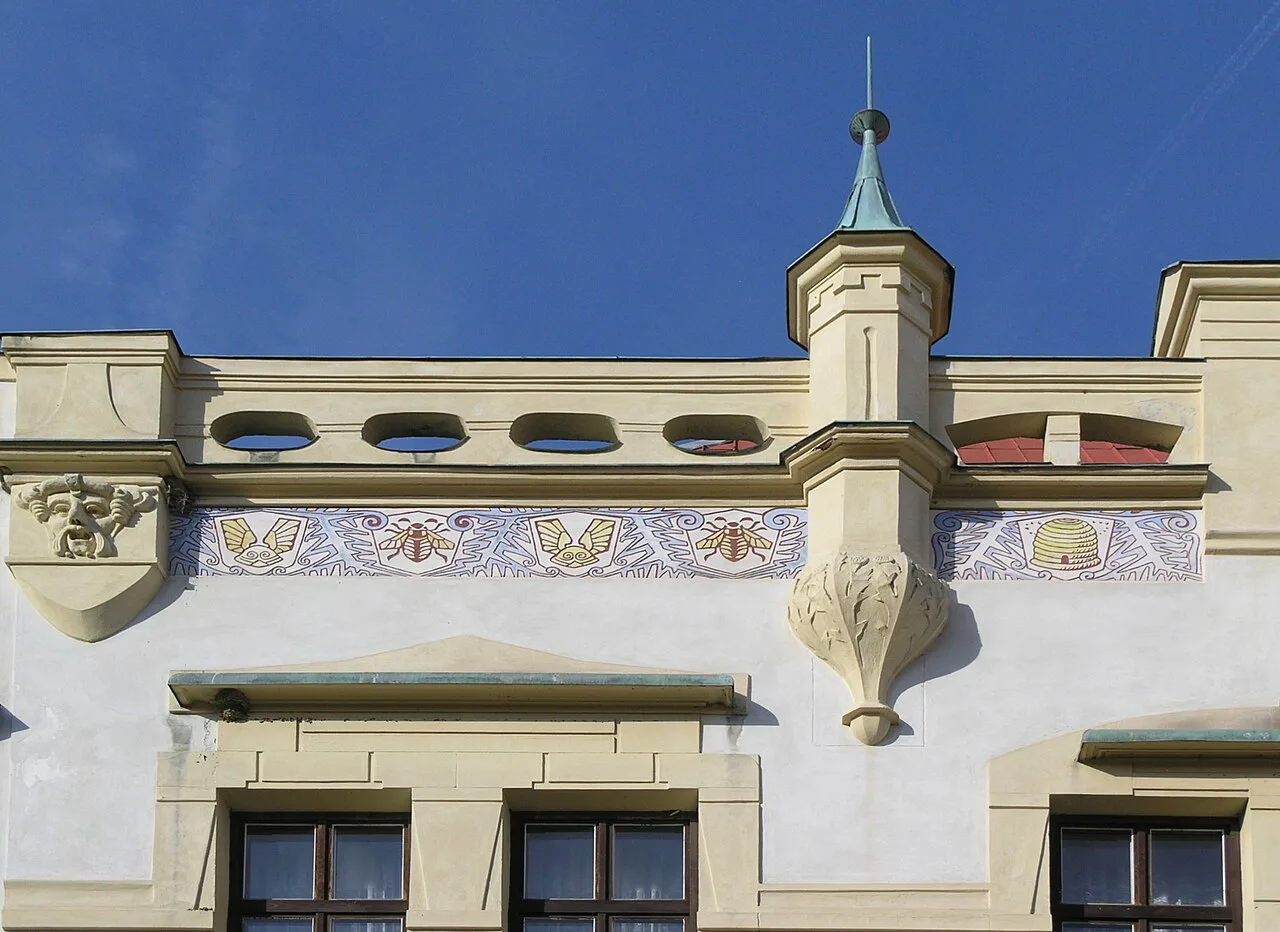 A decorated gable with a small turret on a house in Nepomuk.