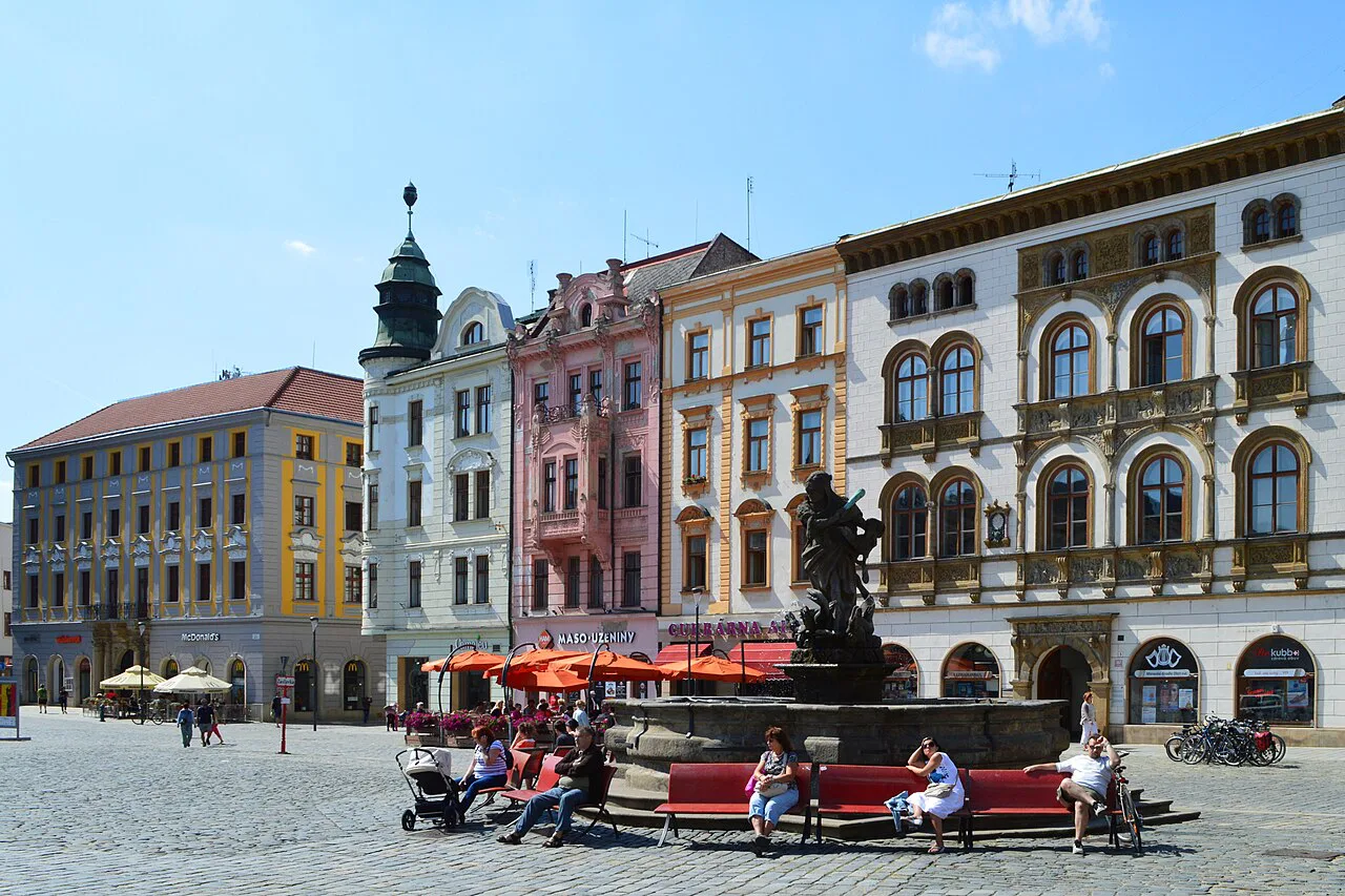 Colorful facades and a Baroque fountain on Horní náměstí, Olomouc.