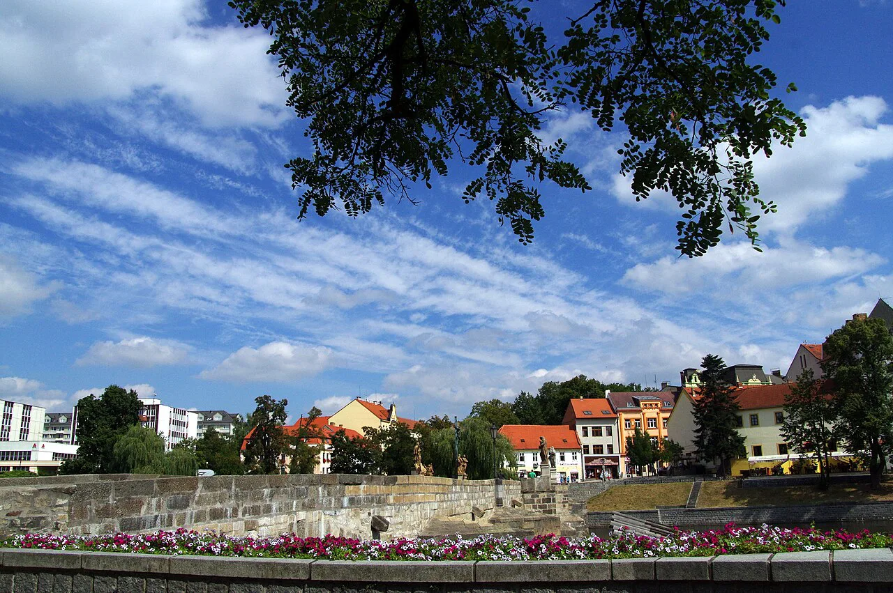 Flower-lined parapet of the Stone Bridge in Písek.