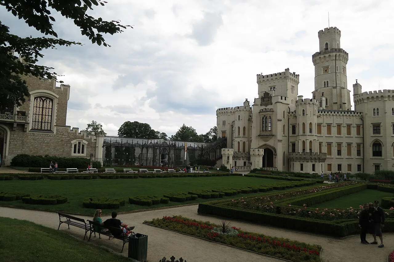 The glasshouse and Hluboká Castle seen across the gardens.