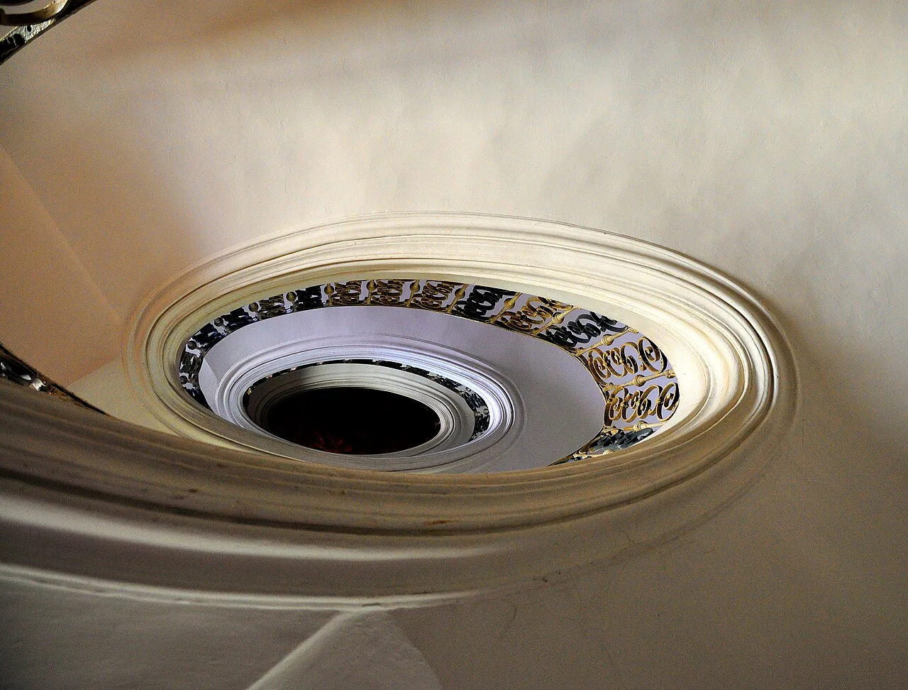 Santini's self-supporting elliptical staircase in Plasy Monastery.