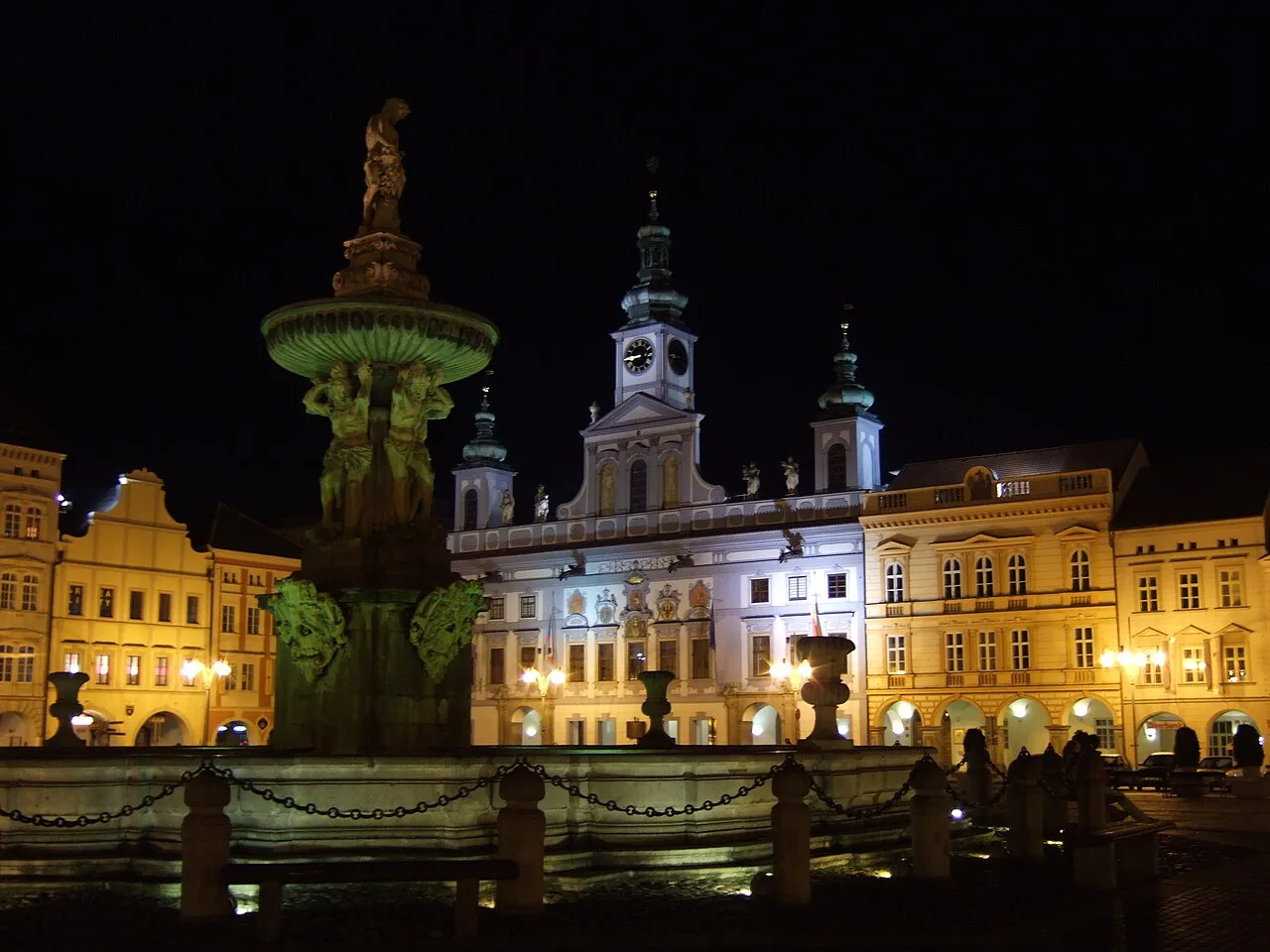 Samson Fountain and the Town Hall lit up at night, České Budějovice.