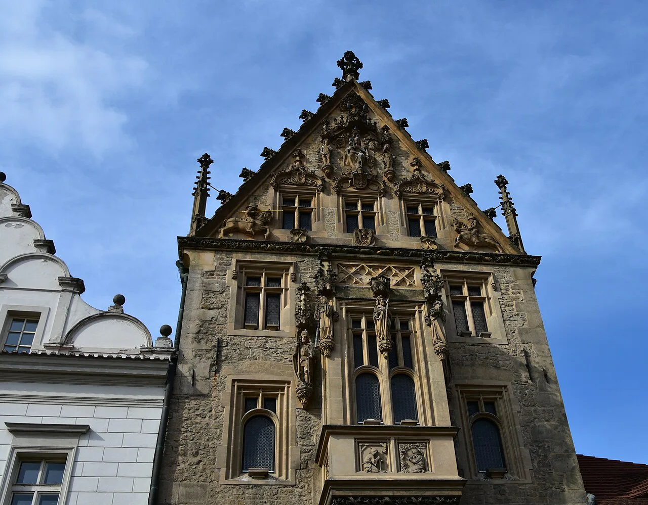 The Gothic gabled facade of the Stone House in Kutná Hora.