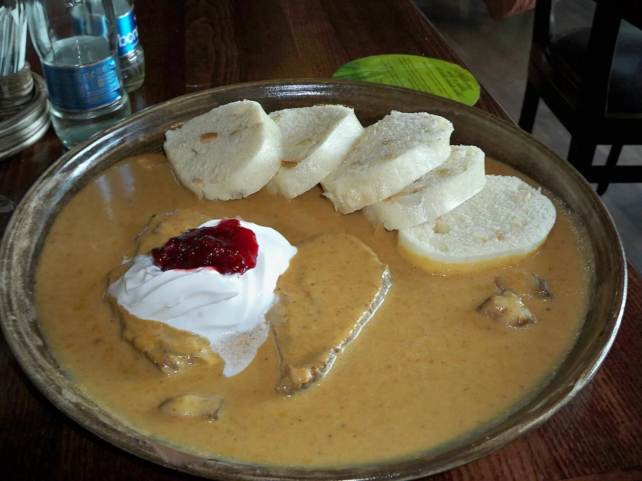 Svíčková na smetaně with cranberry sauce and bread dumplings.