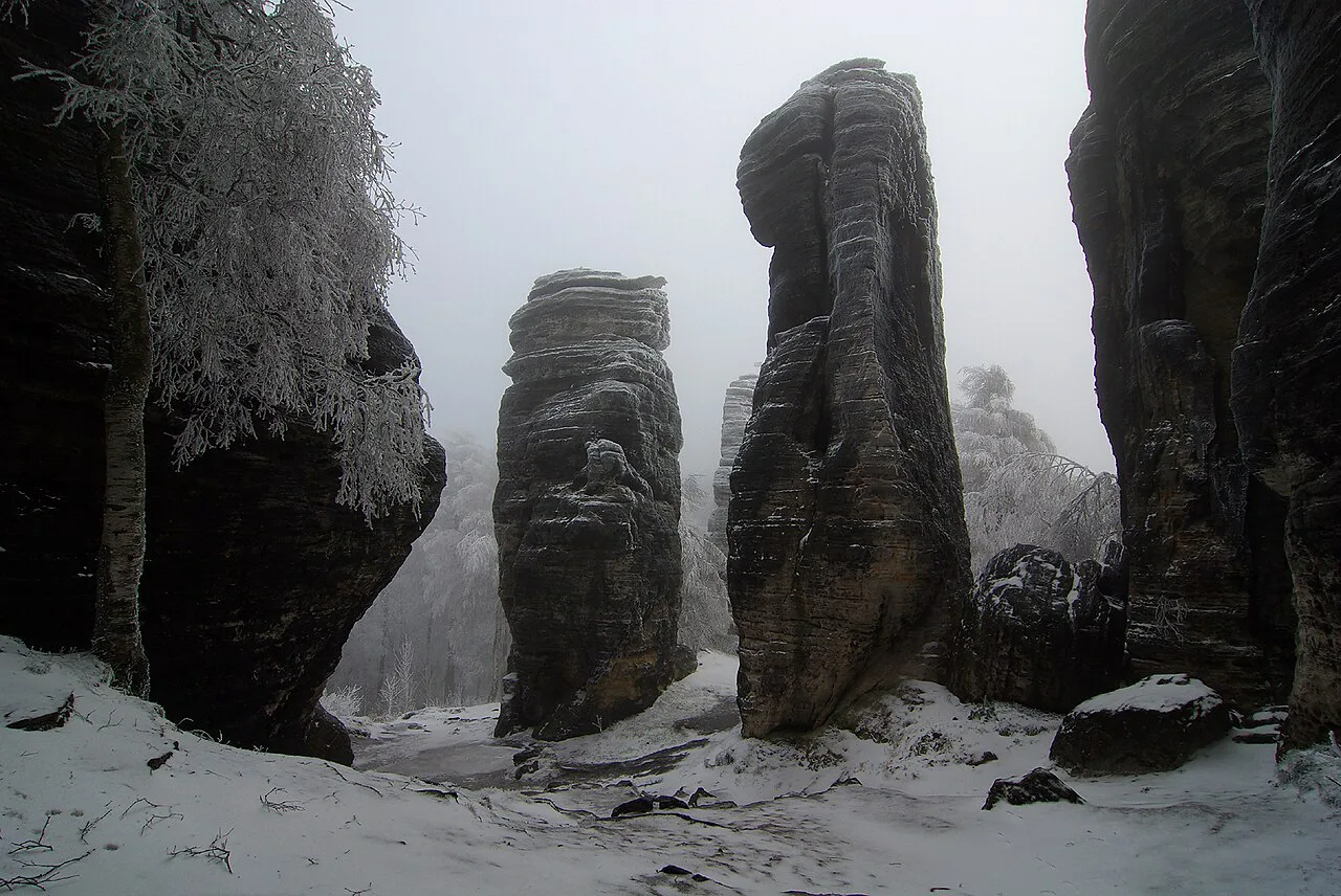 Sandstone pillars of Malé stěny in Tiské stěny in winter.