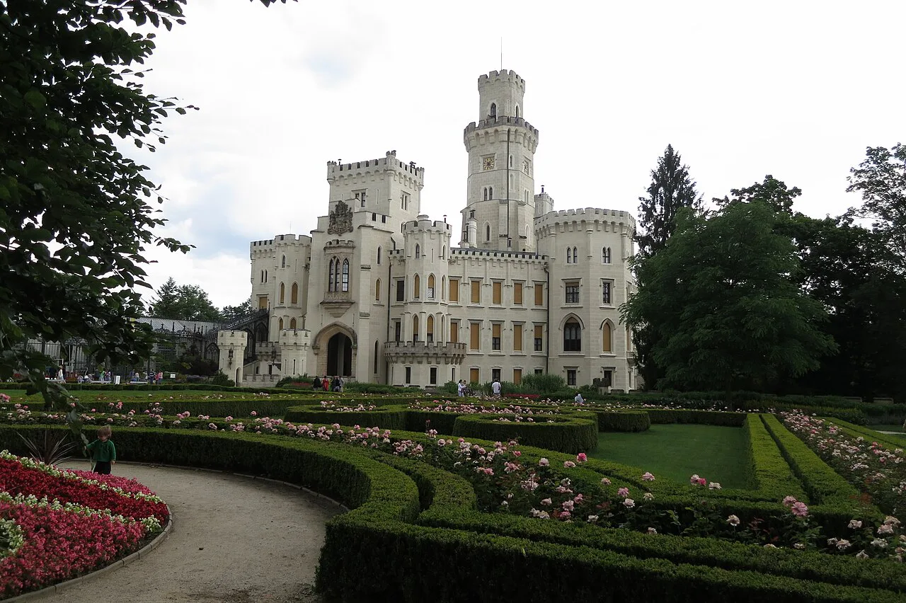 Hluboká Castle above its formal gardens.